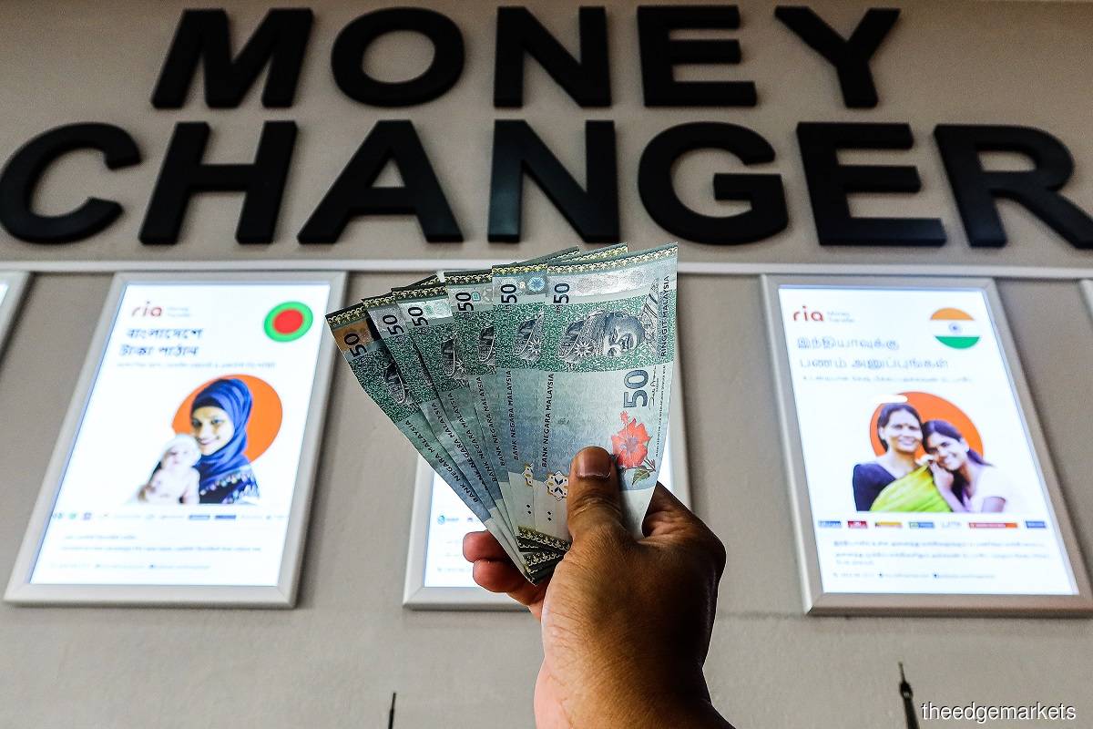 The ringgit fell against the greenback at 4.4250/4270 on Friday (July 8), compared with 4.4060/4085 a week earlier. (Photo by Zahid Izzani Mohd Said/The Edge)